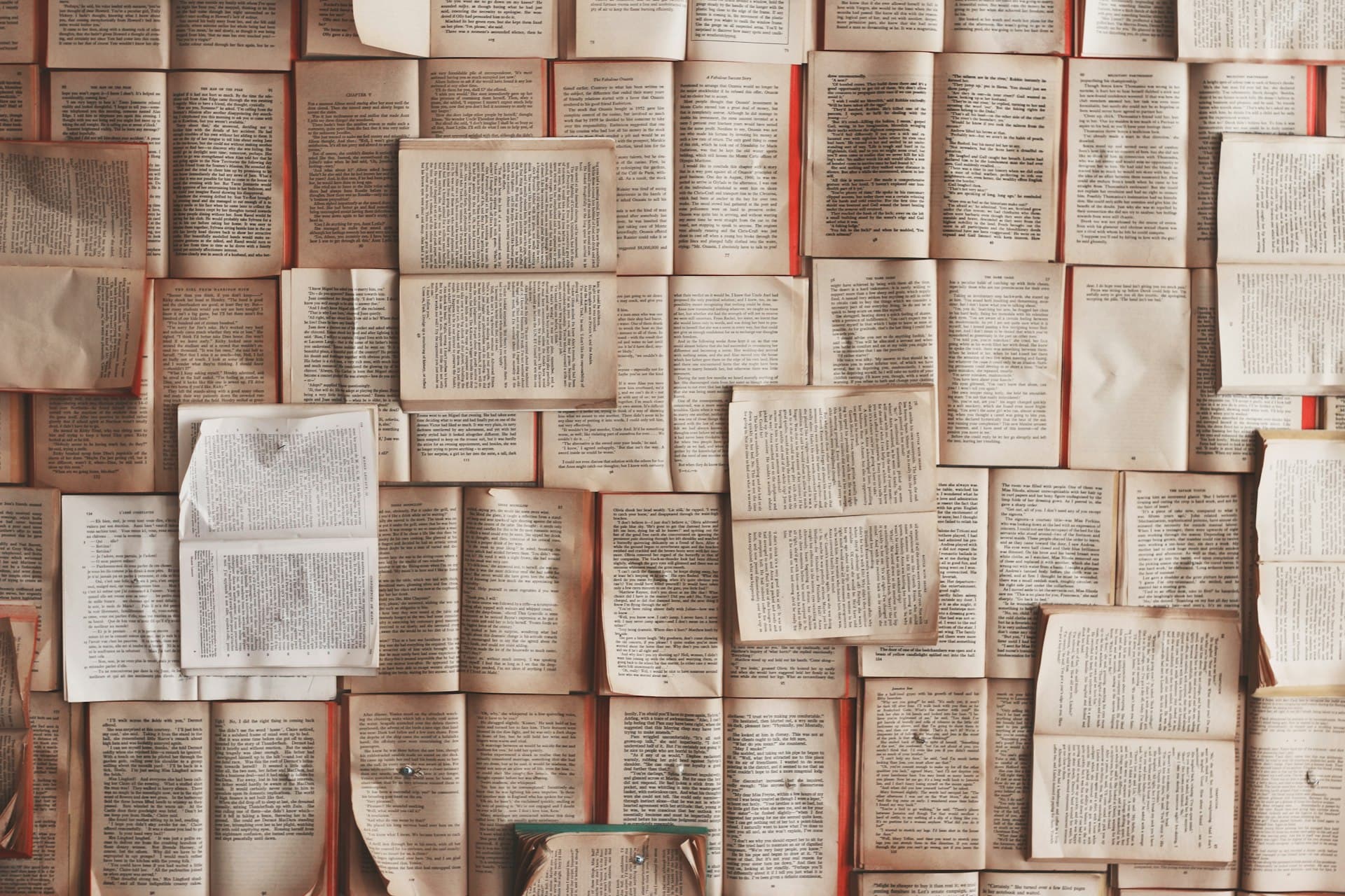 Open books and journal pages representing EHCP research and evidence